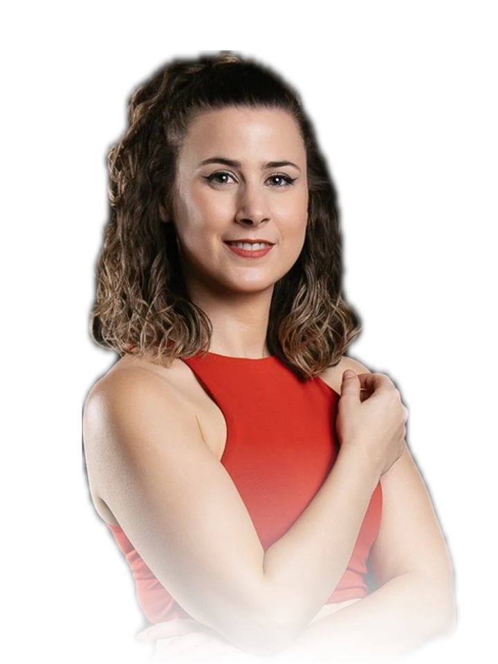 DJ Lau in a red dress with her arms folded