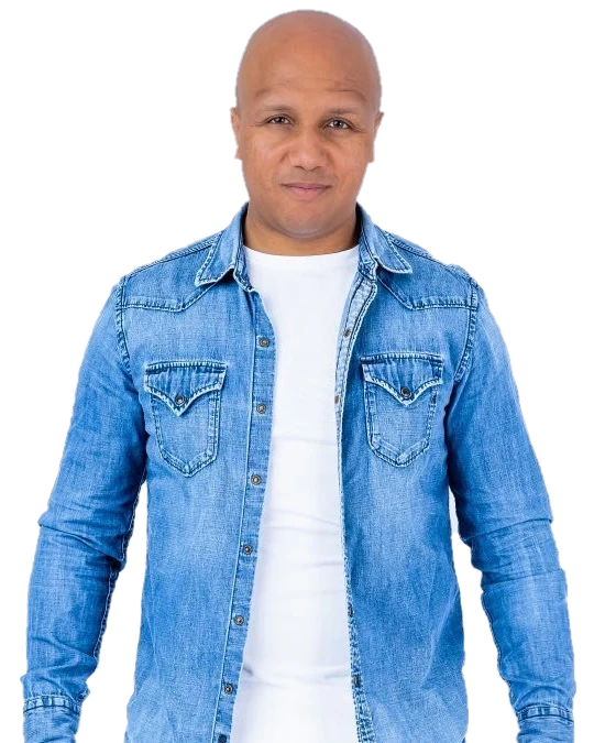 Michael Daimon, founder of Kizz Ryders, in an open denim shirt